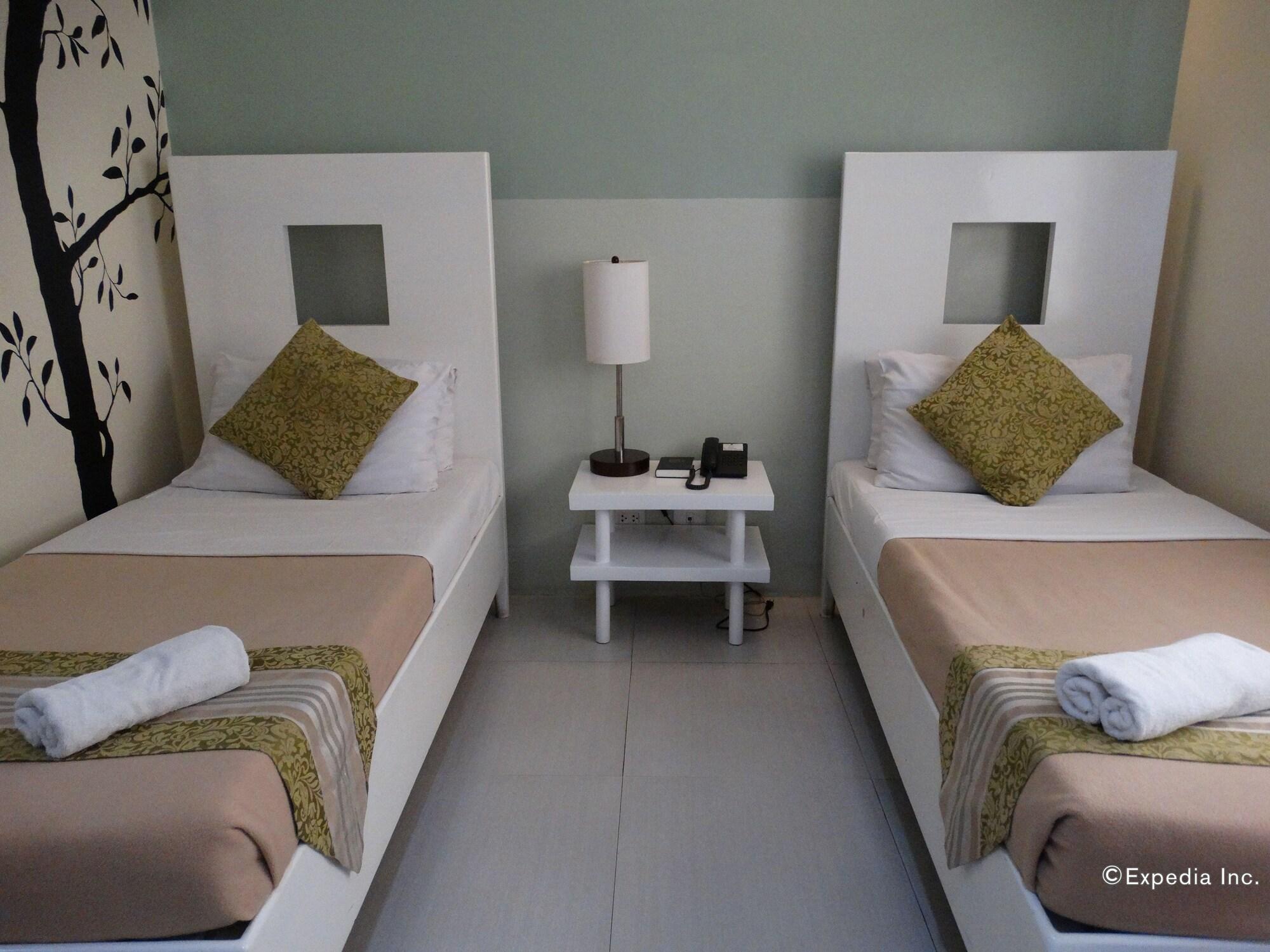 Empire Suites Hotel Puerto Princesa Extérieur photo