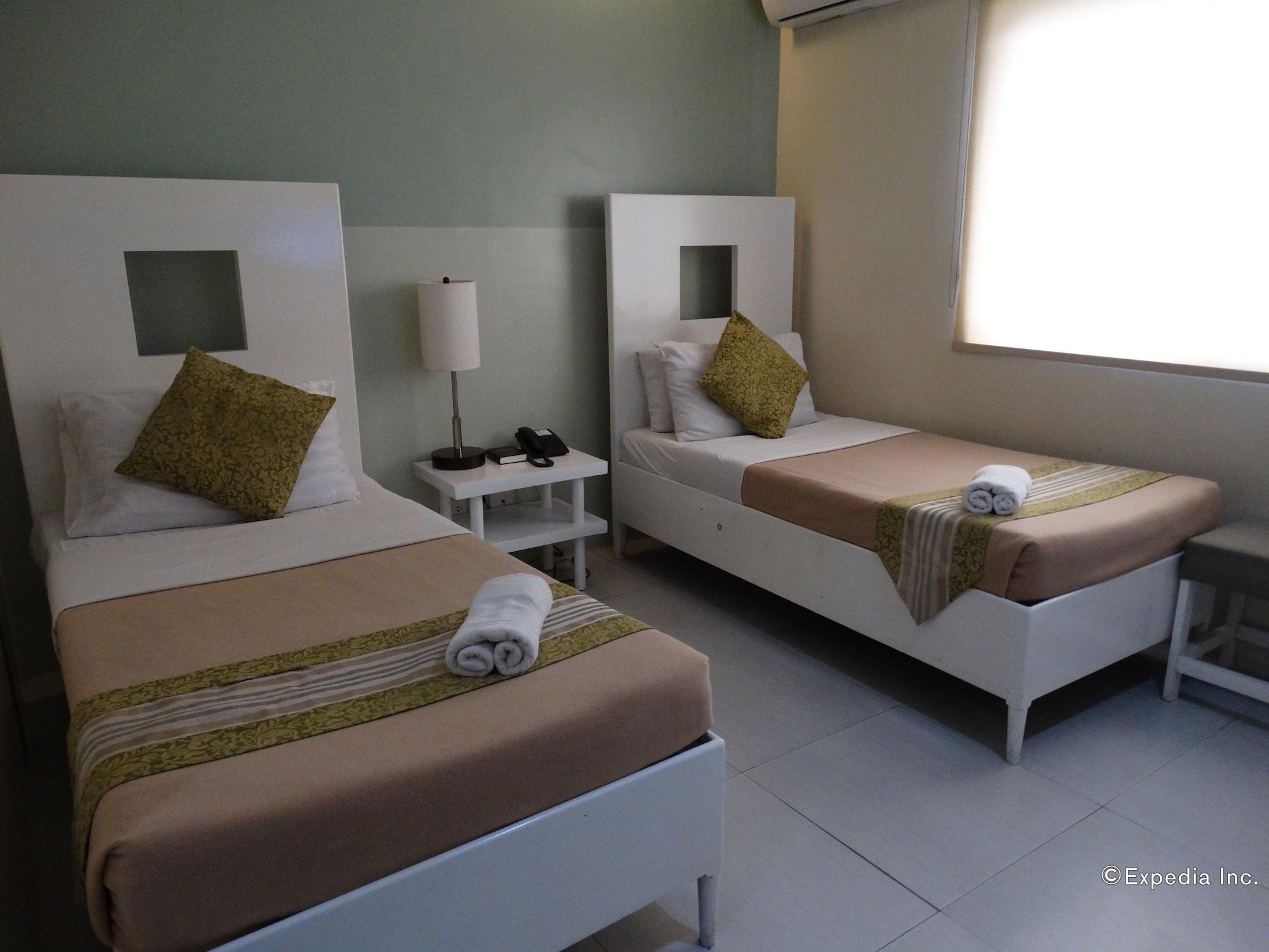 Empire Suites Hotel Puerto Princesa Extérieur photo