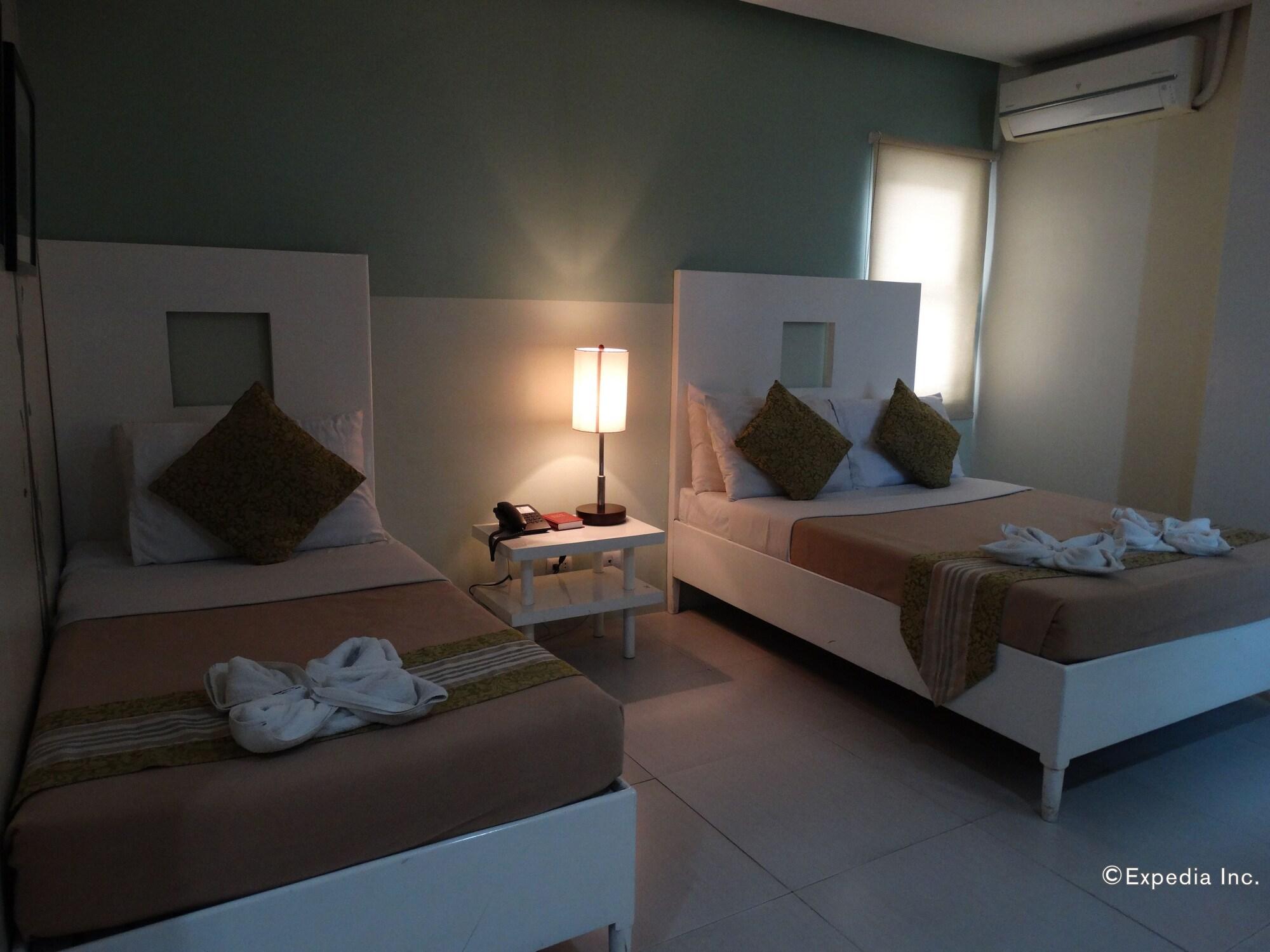 Empire Suites Hotel Puerto Princesa Extérieur photo