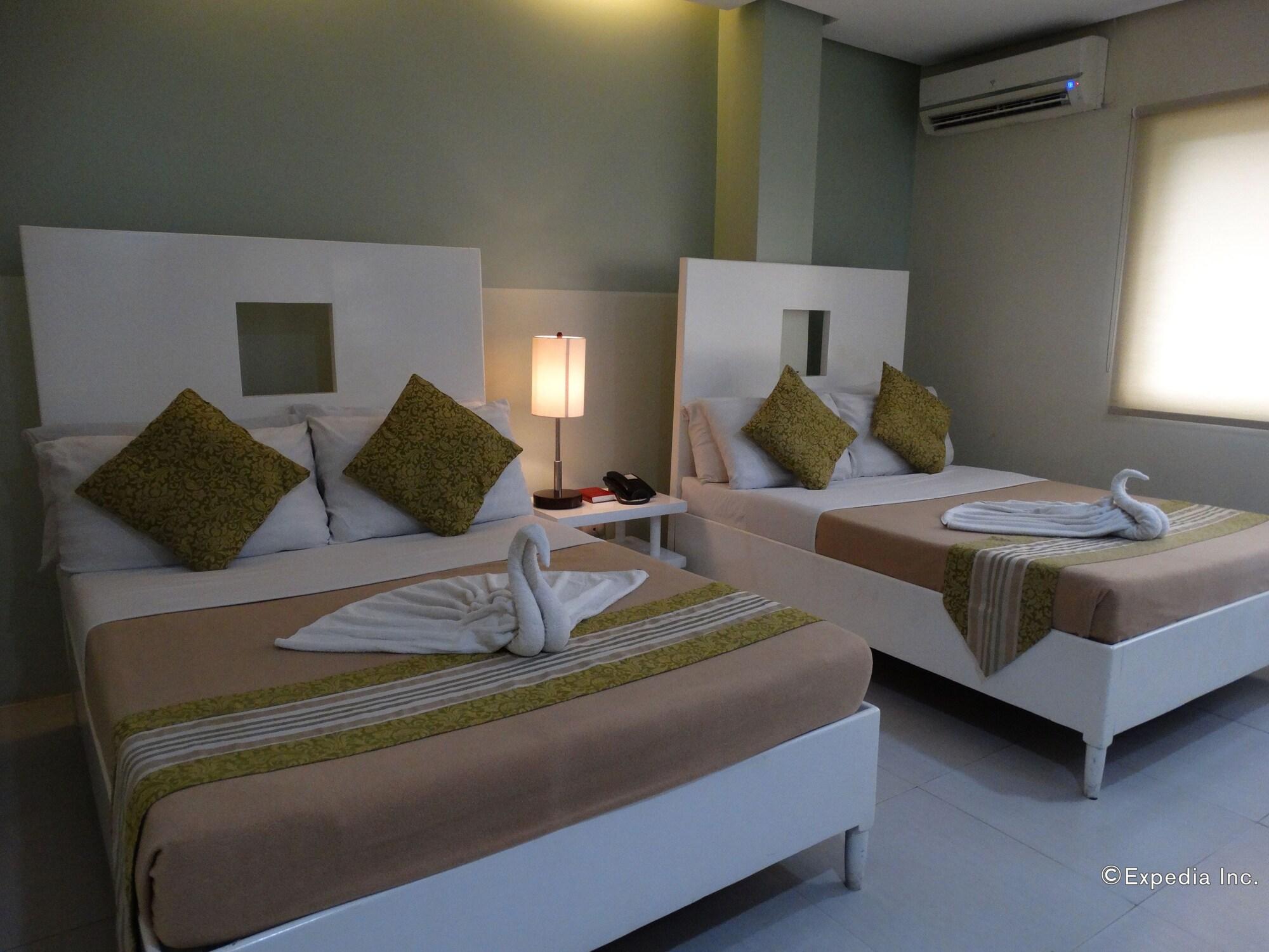 Empire Suites Hotel Puerto Princesa Extérieur photo