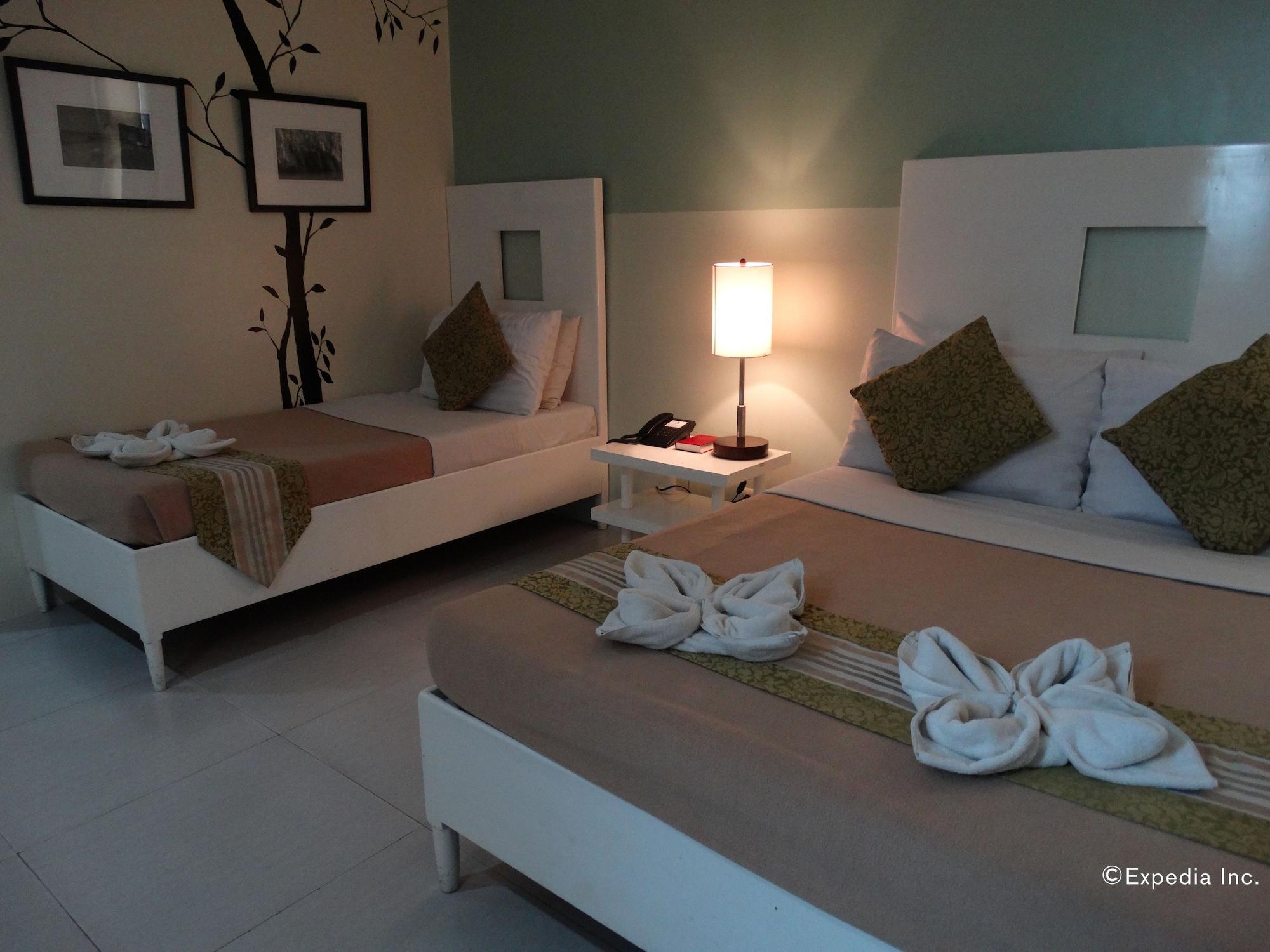 Empire Suites Hotel Puerto Princesa Extérieur photo