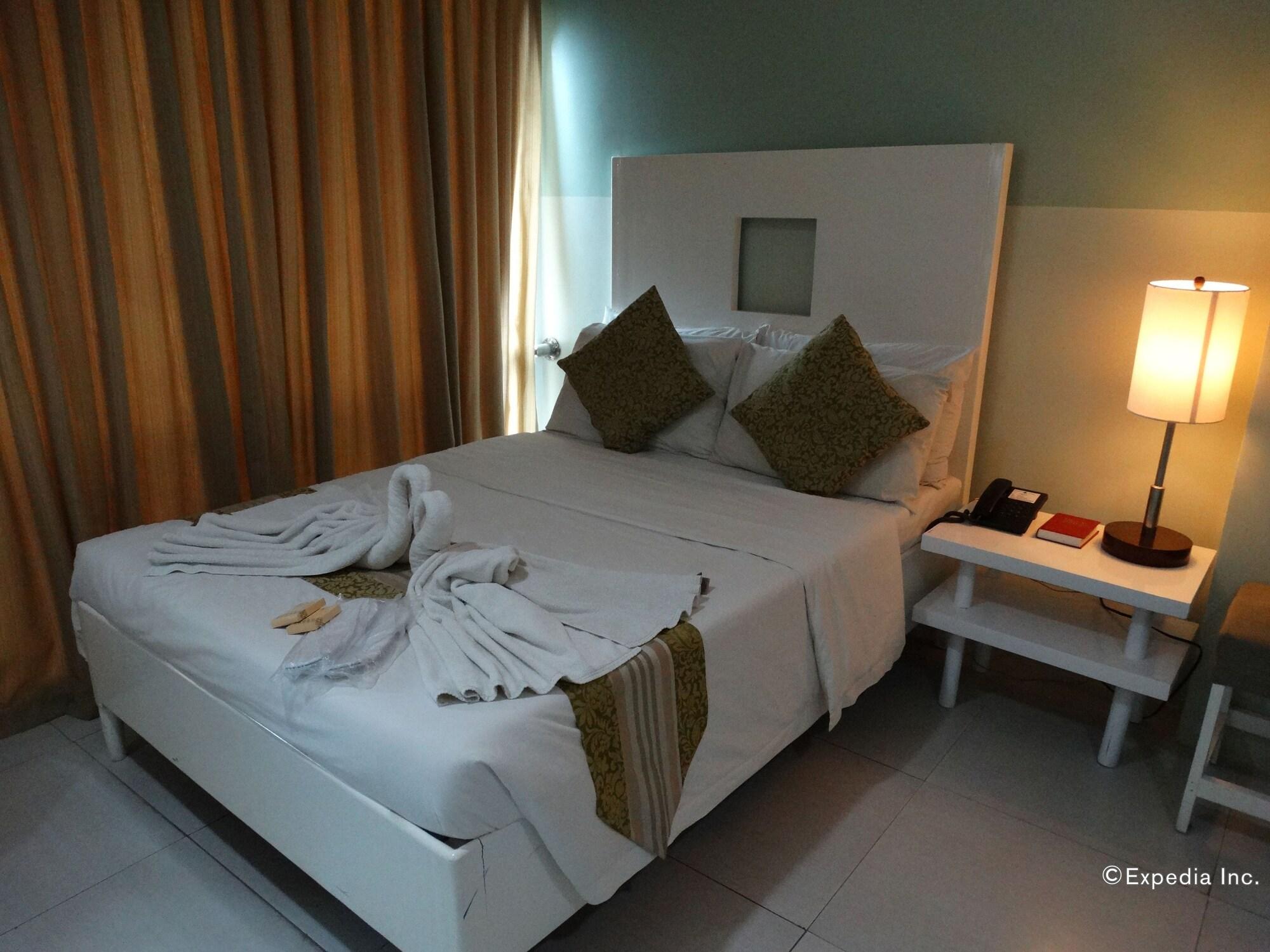 Empire Suites Hotel Puerto Princesa Extérieur photo