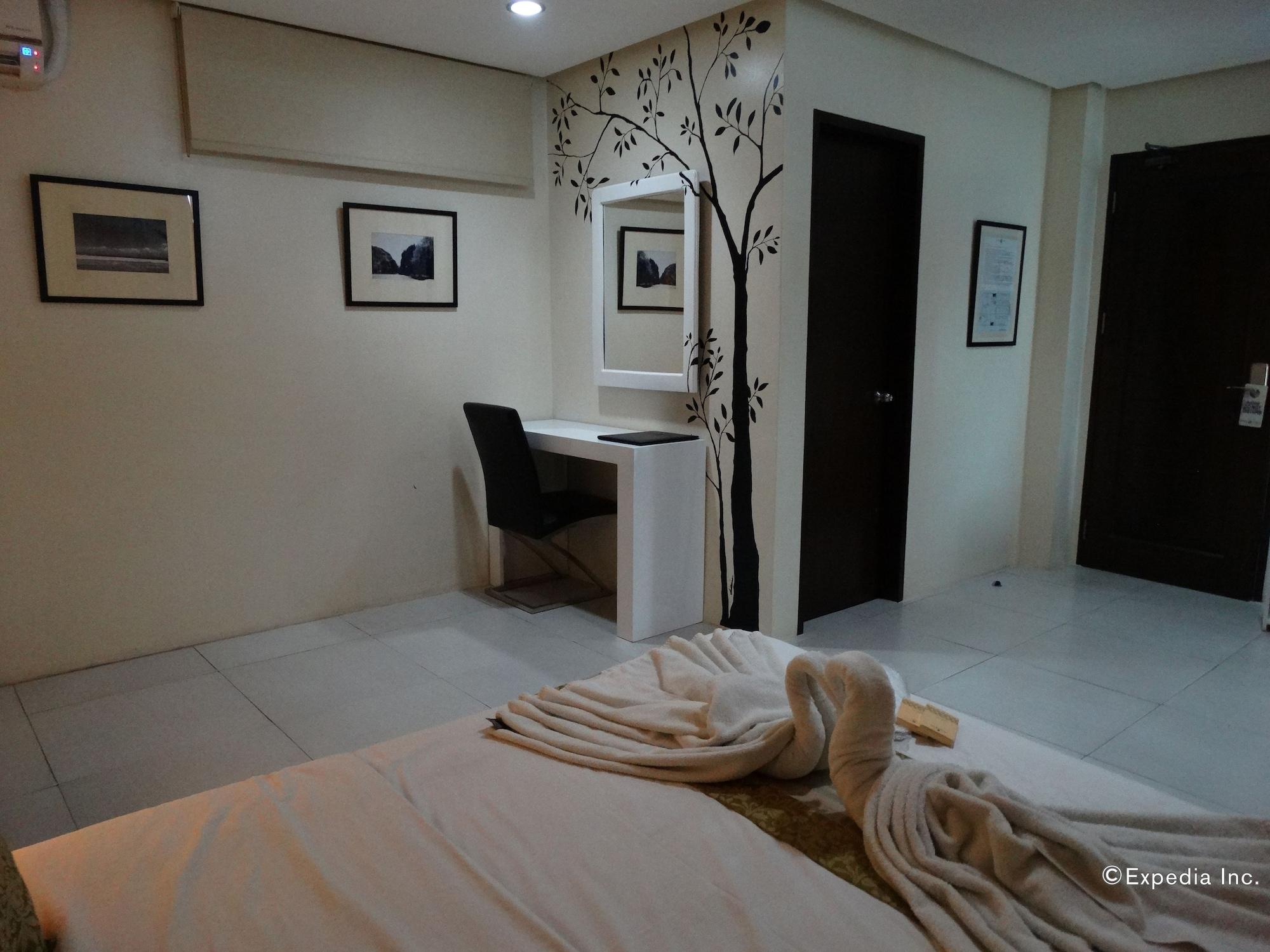 Empire Suites Hotel Puerto Princesa Extérieur photo