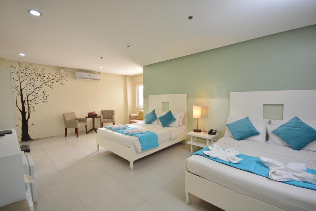 Empire Suites Hotel Puerto Princesa Extérieur photo