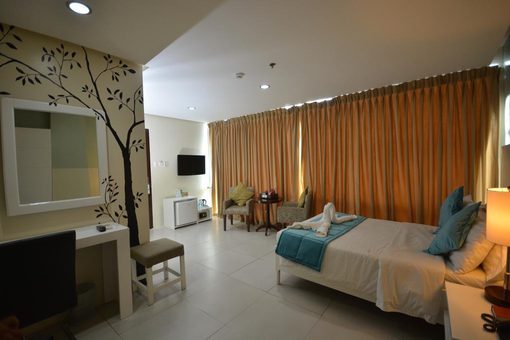 Empire Suites Hotel Puerto Princesa Extérieur photo