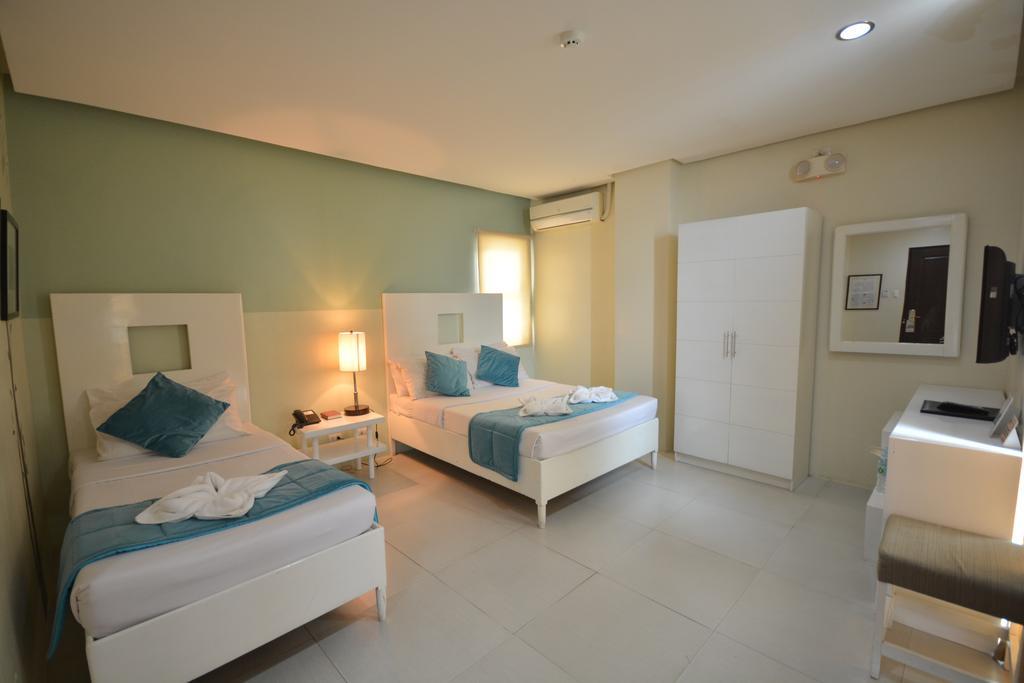 Empire Suites Hotel Puerto Princesa Extérieur photo