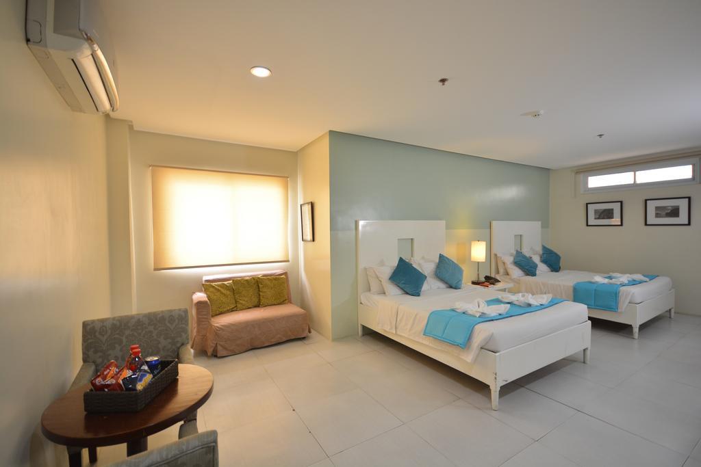 Empire Suites Hotel Puerto Princesa Extérieur photo
