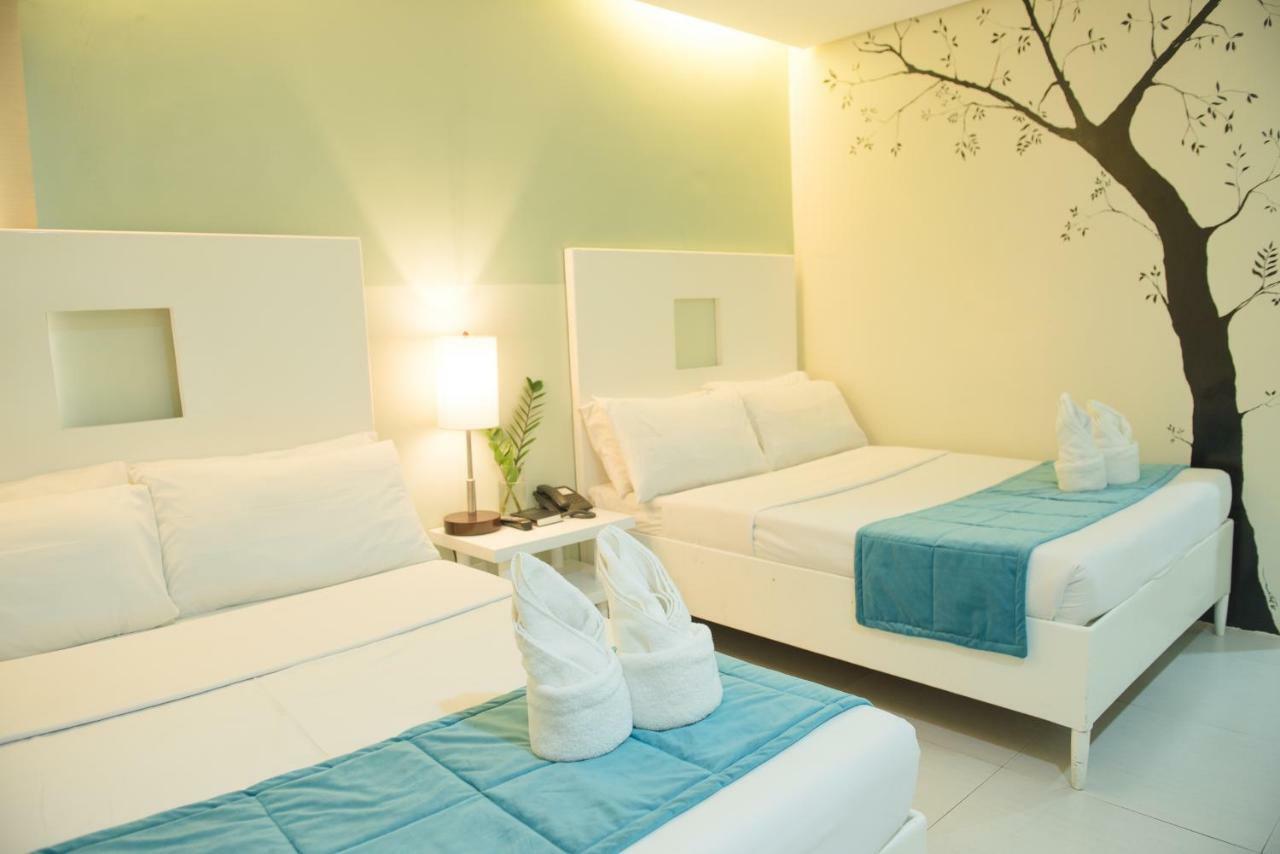 Empire Suites Hotel Puerto Princesa Extérieur photo